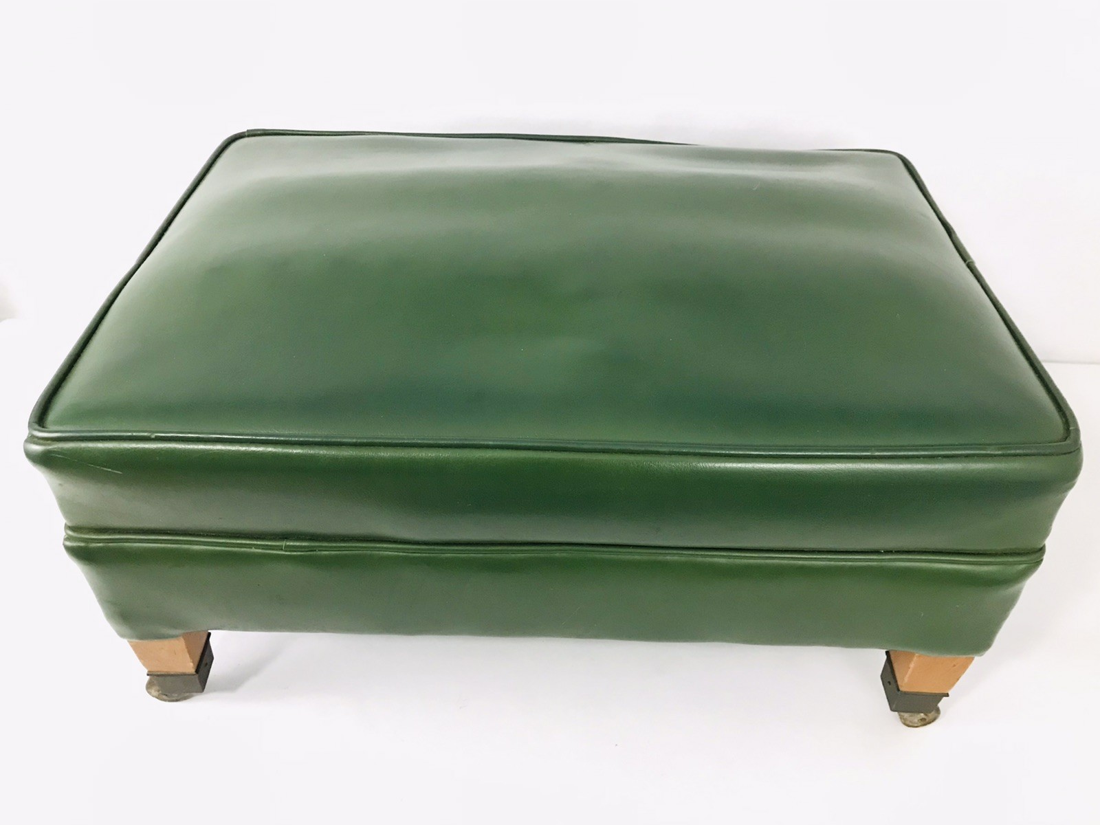 Vintage MCM Green Leather Ottoman With Metal Wheels Wooden Legs